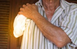 Asia Elderly Man With One Arm And Arm Prosthetic